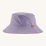 Patagonia kids bucket hat in a pastel purple colour on a cream background.