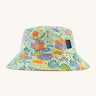 Patagonia kids bucket hat in a pastel green colour and multicoloured pattern design on a cream background.