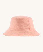 Patagonia kids bucket hat in pink colour on a cream background.