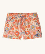 The Patagonia Kids Costa Rica Baggies Shorts featuring a floral Way Back / Sunlit Pink design on a plain background. 
