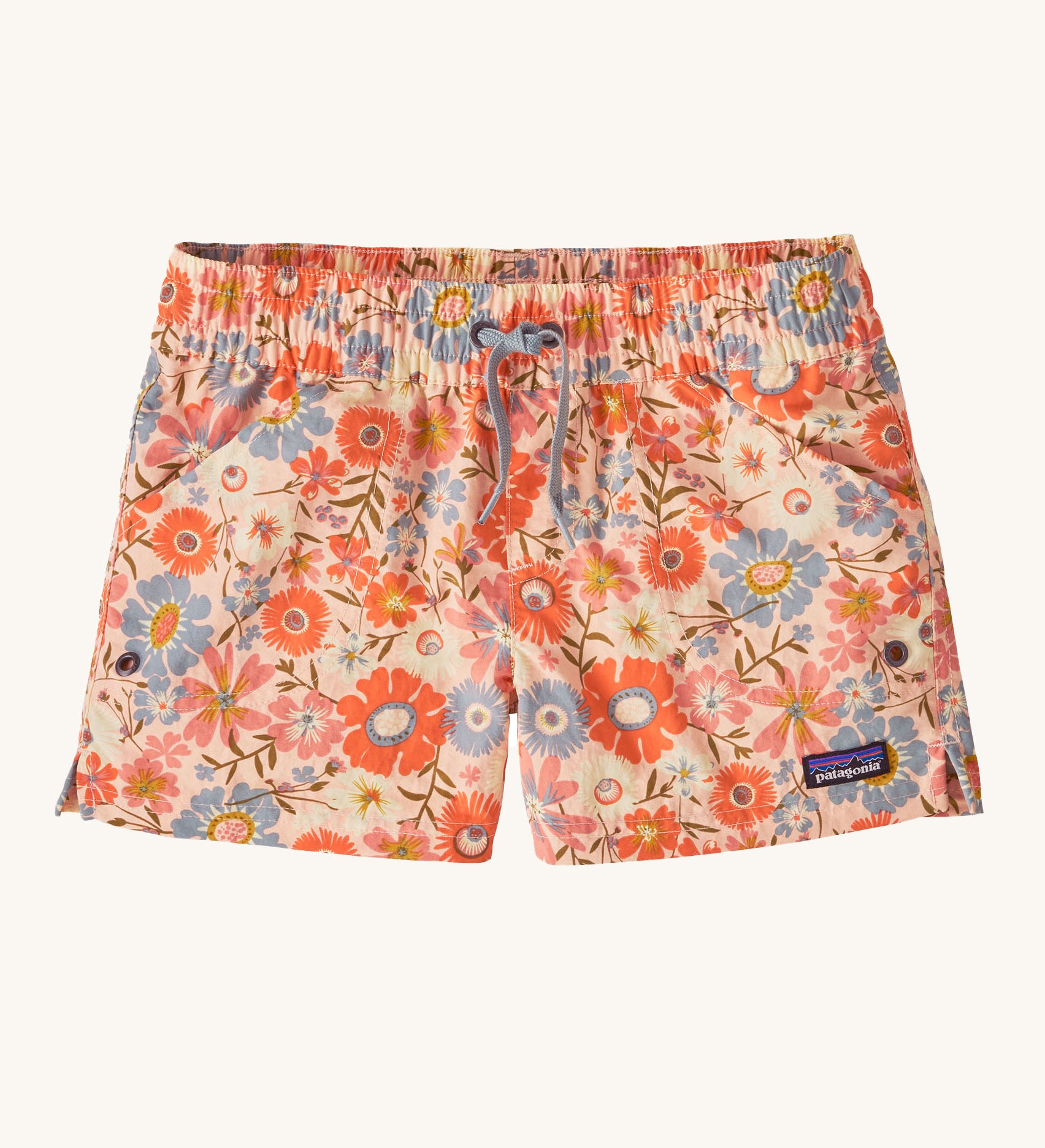 The Patagonia Kids Costa Rica Baggies Shorts featuring a floral Way Back / Sunlit Pink design on a plain background. 