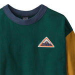 Close up of logo on teh chest of Patagonia Kids Crew Sweatshirt - Driftways Patch: Cascade Green