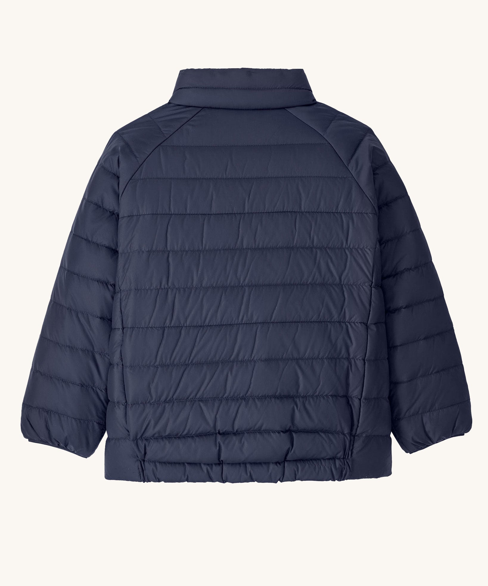 The back of the Patagonia Little Kids Down Sweater kids jacket in a New Navy colour on plain background. 