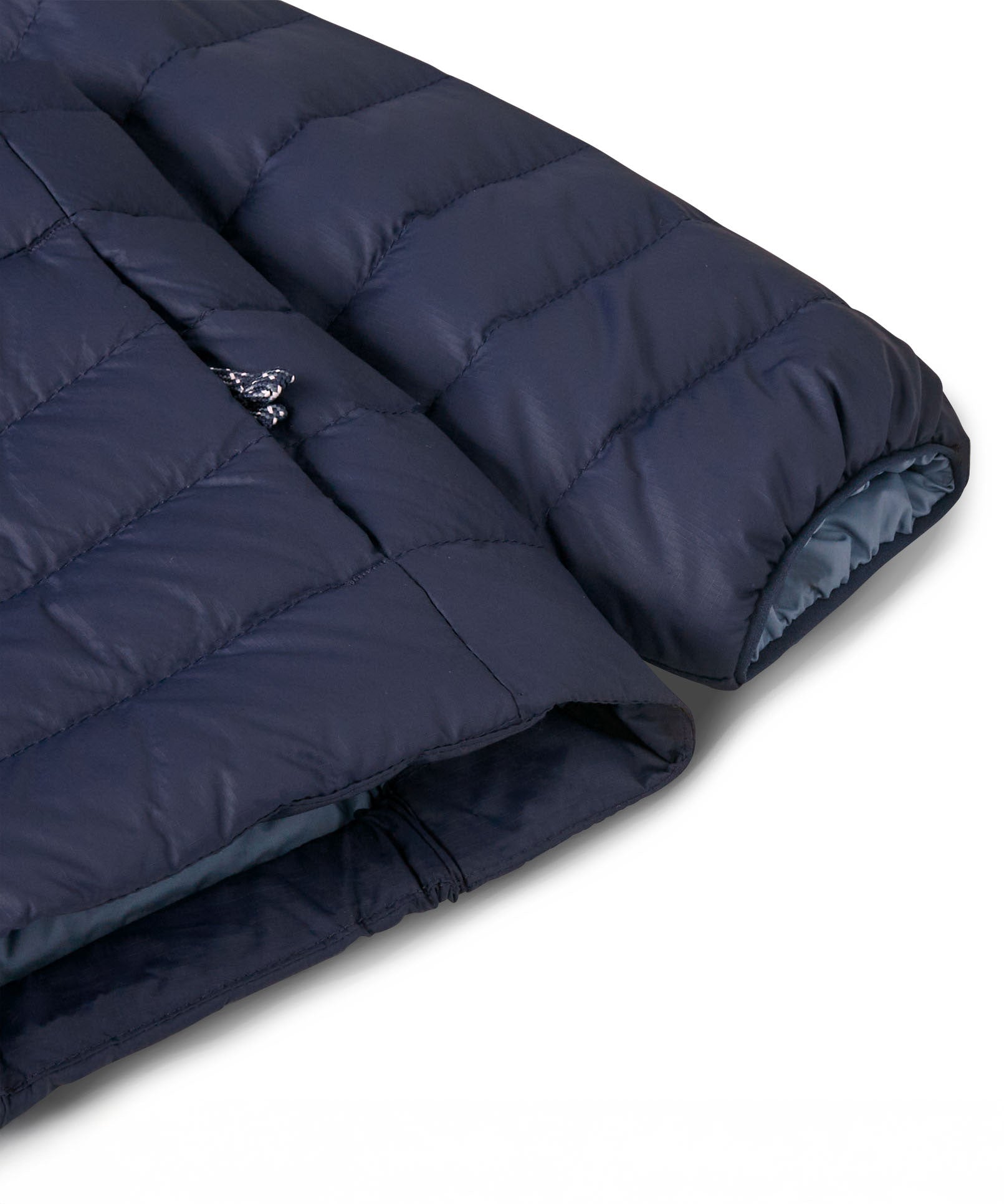 A close up of the sleeves ion the Patagonia Little Kids Down Sweater kids jacket in a New Navy colour on plain background. 