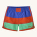 Patagonia kids swim shorts in 3 colour-block panel stripes - blue, red and light green - with binding down the seams and leg openings in red and scalloped detail at the side. Made with quick-drying NetPlus® 100% post-consumer recycled nylon.