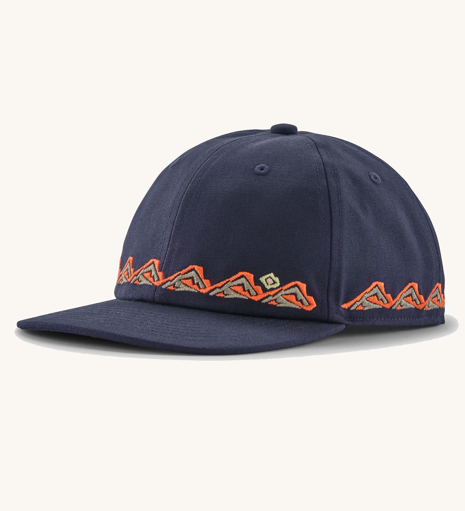 Patagonia kid's funhoggers hat in new navy with orange trailtreck pattern around the edge.