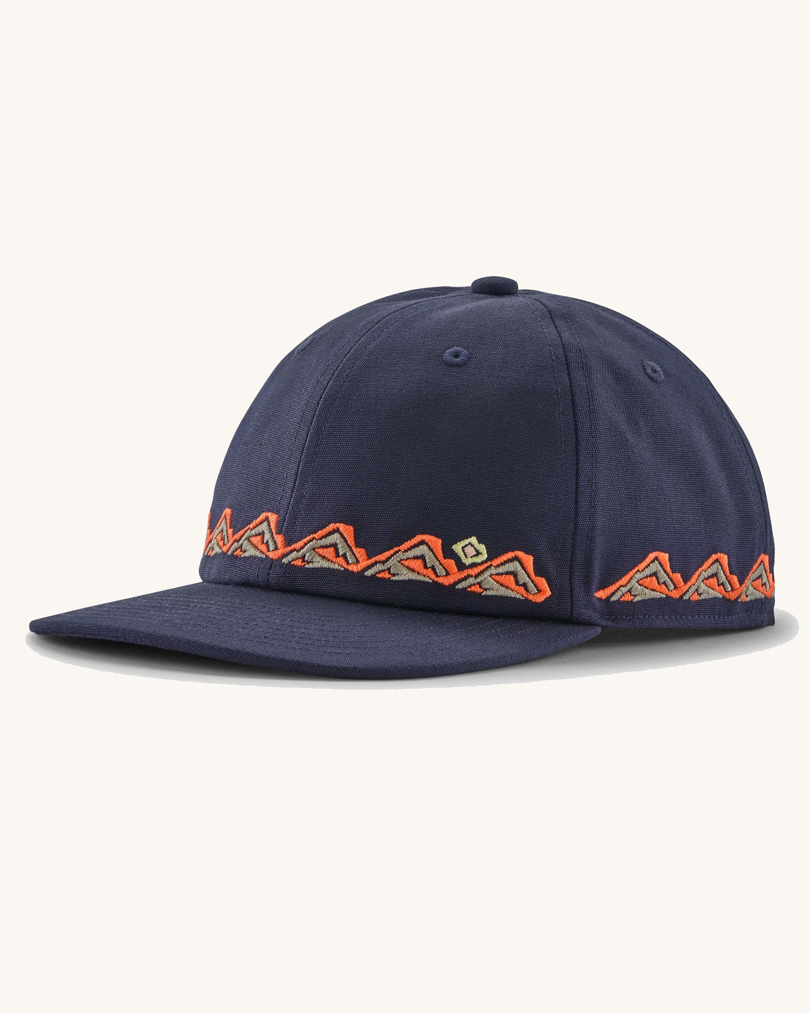Patagonia kid's funhoggers hat in new navy with orange trailtreck pattern around the edge.