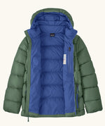 Patagonia kids hi-loft down sweater hoody windproof jacket in canopy green with a blue lining, zipped handwarmer pockets and small black logo on chest. Zip fully open showing the zipped pocket on the inside chest 