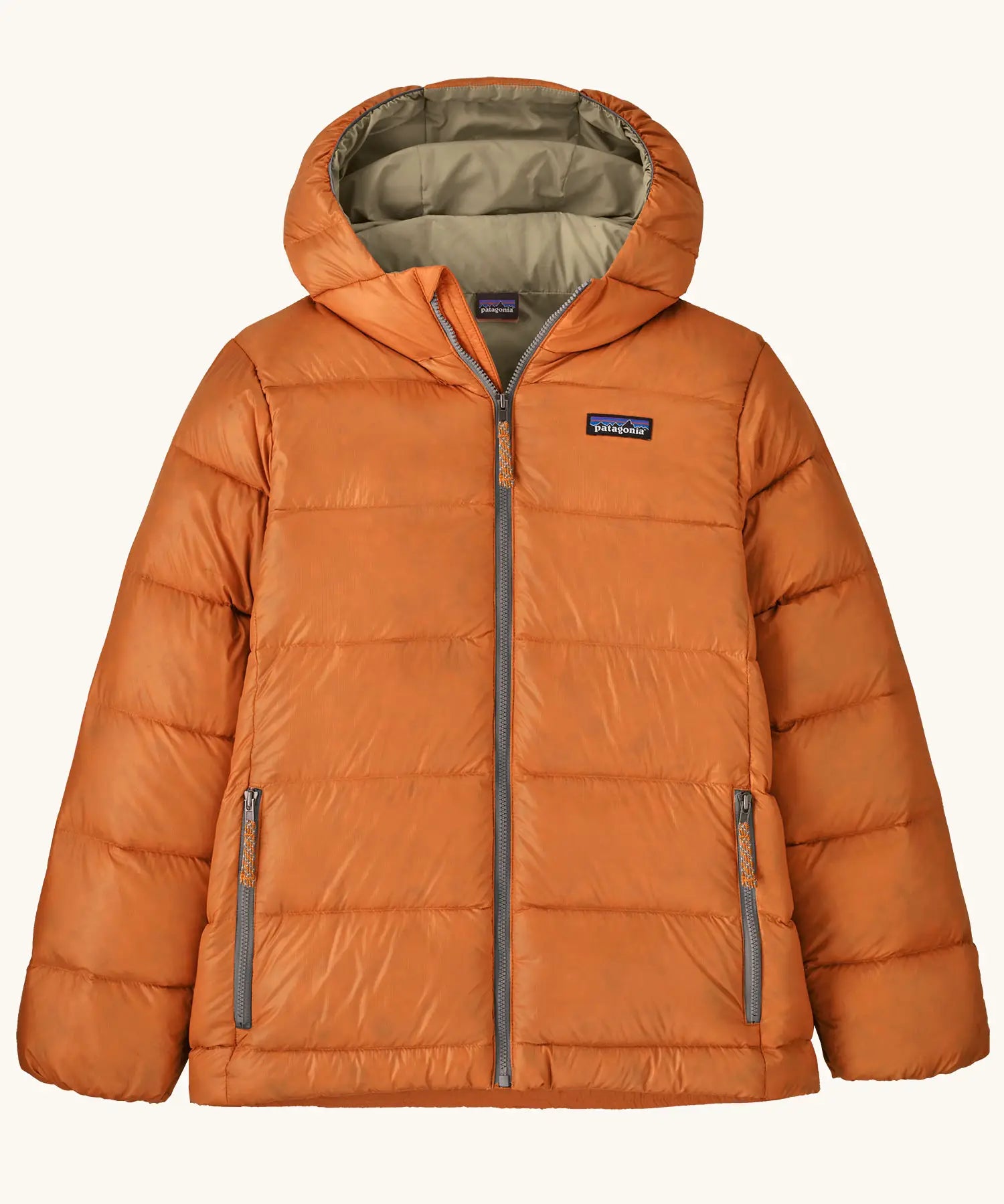 Patagonia kids hi-loft down sweater hoody windproof jacket in marigold orange with muted yellow lining, zipped hand pockets and small black logo on chest.