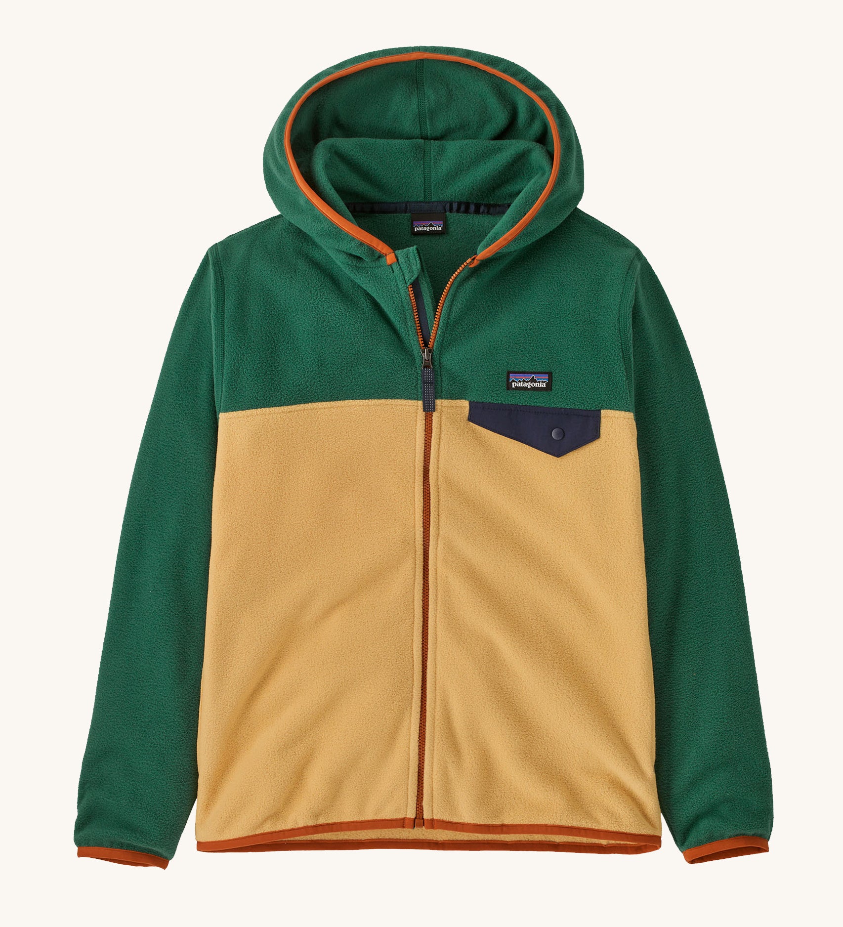 Patagonia Kids Micro D Snap-T jacket in a beeswax tan colour way on a plain background.