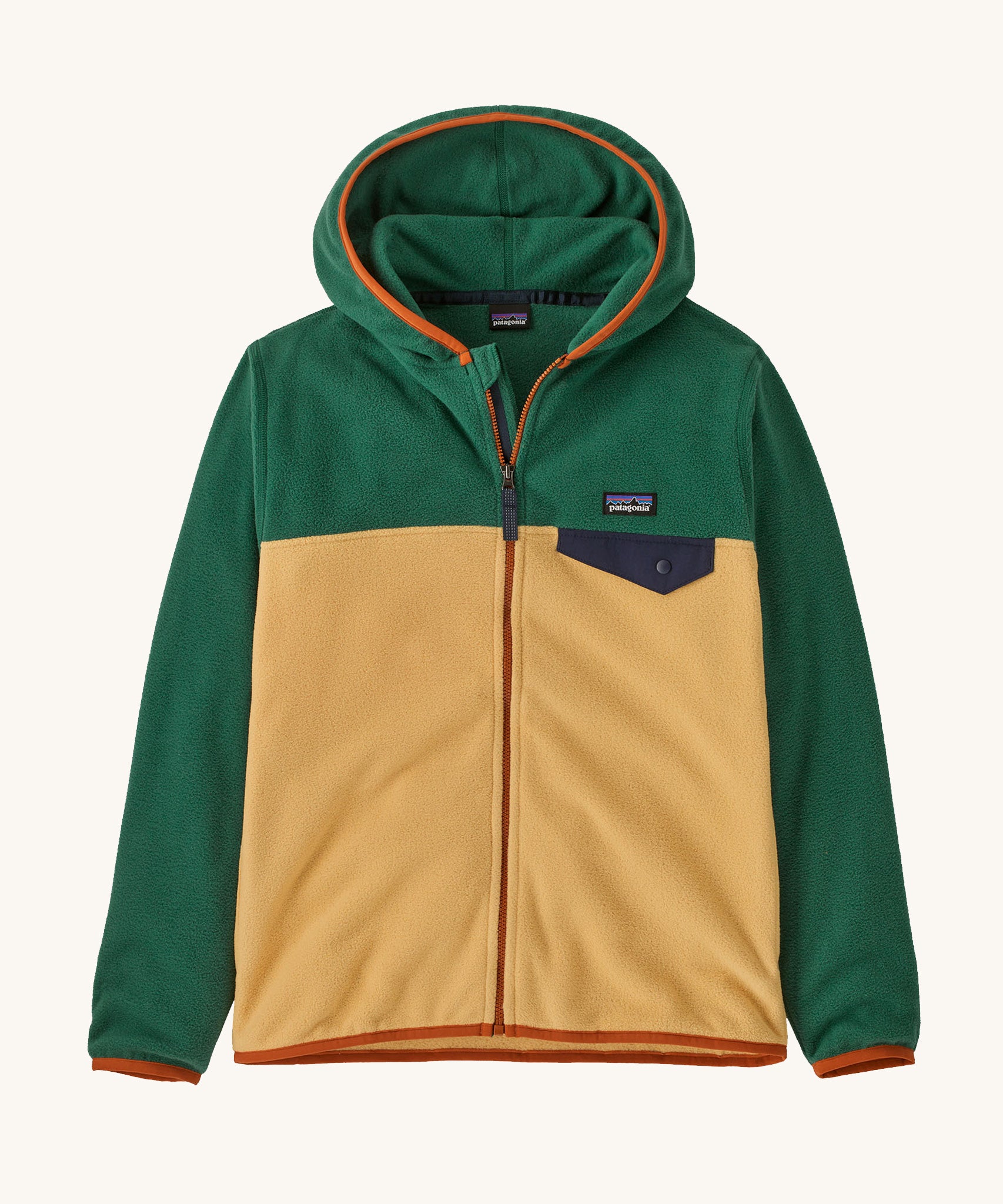 Patagonia Kids Micro D Snap-T jacket in a beeswax tan colour way on a plain background.