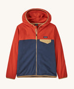 Patagonia Kids Micro D Snap-T Jacket in a New Navy colour on a plain background. 