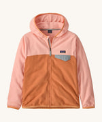 Patagonia kids hooded fleece in a light pink colour on a cream background.
