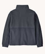 The back of the Patagonia Kids Microdini 1/2 Zip Fleece Pullover in a smolder Smolder Blue colour. A 100% recycled polyester soft fleece in dark blue. Features a turn up collar with a half length zip, elasticated cuffs and a chest pocket.