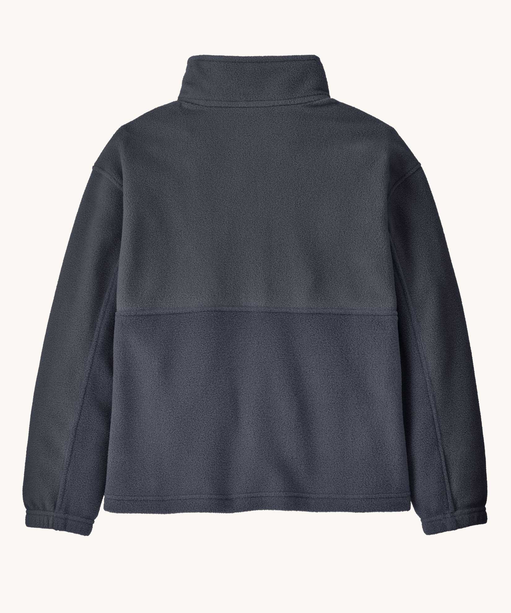 The back of the Patagonia Kids Microdini 1/2 Zip Fleece Pullover in a smolder Smolder Blue colour. A 100% recycled polyester soft fleece in dark blue. Features a turn up collar with a half length zip, elasticated cuffs and a chest pocket.