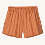 The Patagonia Kids Multi Trails Shorts 4 Inch in Rock Melon, technical sports shorts in peach pink with side seam pockets and a minimal elasticated waistband. Made from 90% OceanCycle recycled polyester.