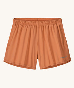 The Patagonia Kids Multi Trails Shorts 4 Inch in Rock Melon, technical sports shorts in peach pink with side seam pockets and a minimal elasticated waistband. Made from 90% OceanCycle recycled polyester.