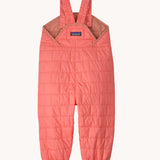 The back of the Patagonia kids nano puffer winter overalls in pink. Features popper fasteners on each shoulder strap for size adjustment. 