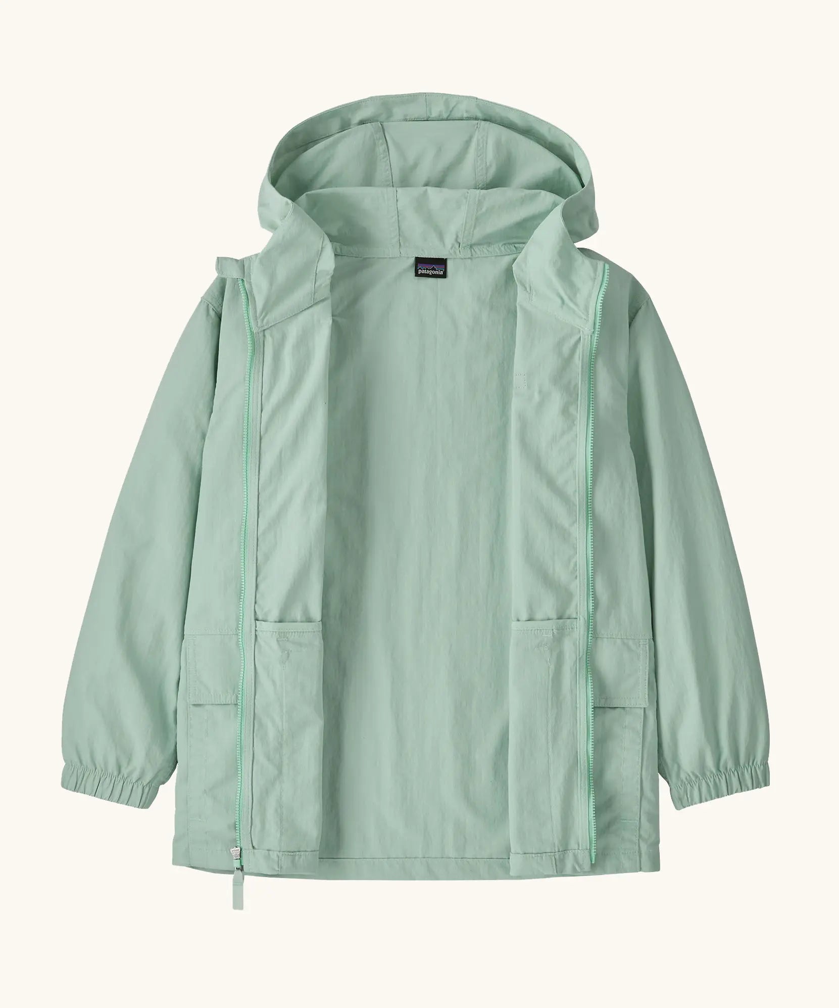 Patagonia little kids recycled nylon outdoor everyday jacket in mint green. Shows full length front popper and zip open