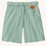 Back of the Patagonia kid's outdoor everyday 6 inch shorts in thin ice light green with one back pocket and a brown logo badge.