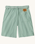 Back of the Patagonia kid's outdoor everyday 6 inch shorts in thin ice light green with one back pocket and a brown logo badge.