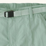 Close up of Patagonia kid's outdoor everyday 6 inch shorts in  light green showing quick release buckle belt.