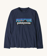 Patagonia Kids long sleeved top - Navy, made from organic cotton with the Patagonia mountain range logo on the front