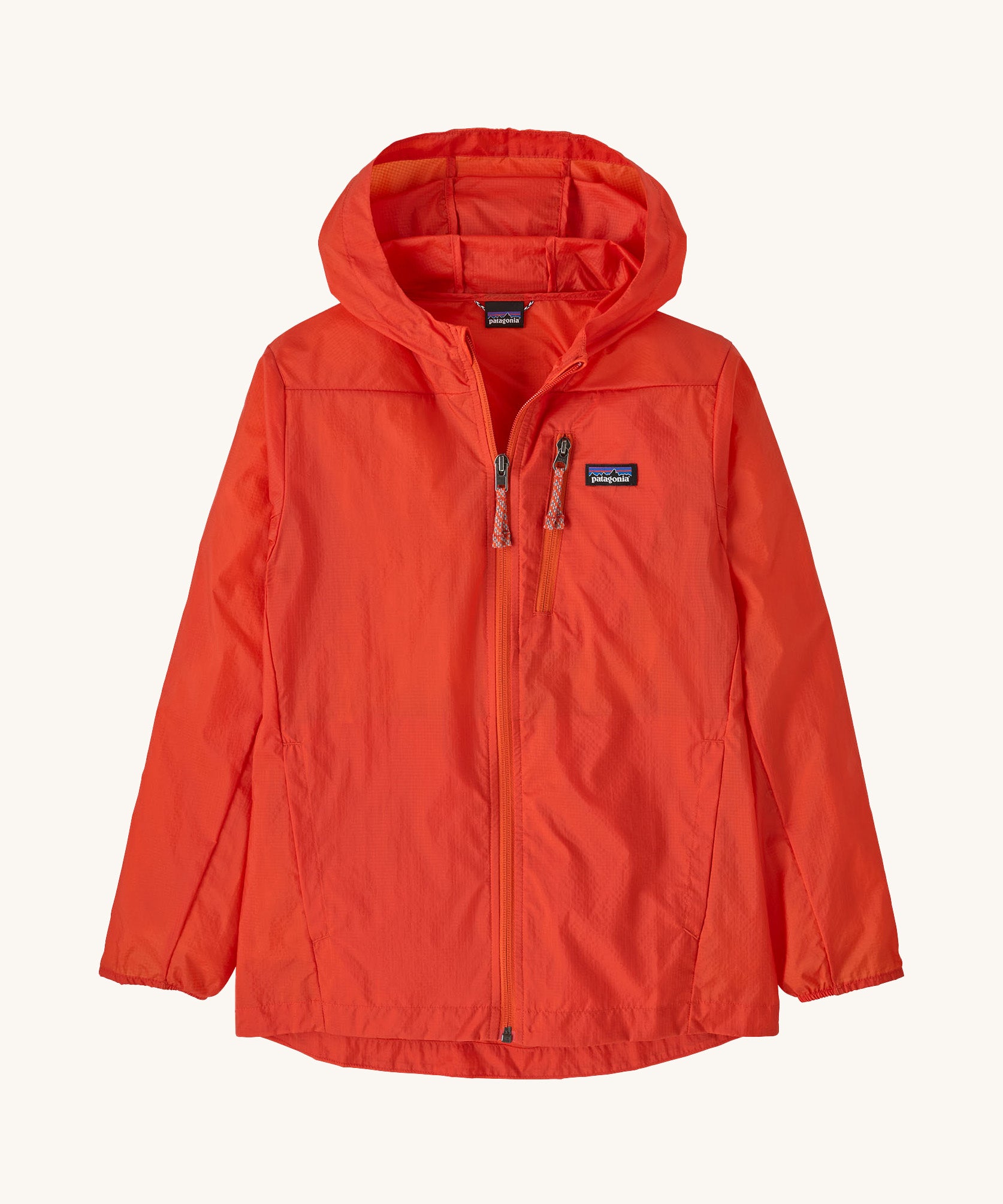 Patagonia orange houdini zip up hooded jacket on a cream background