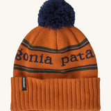 Patagonia Kids  Powder Town Beanie in an orange Redtail Rust colour on a plain background.