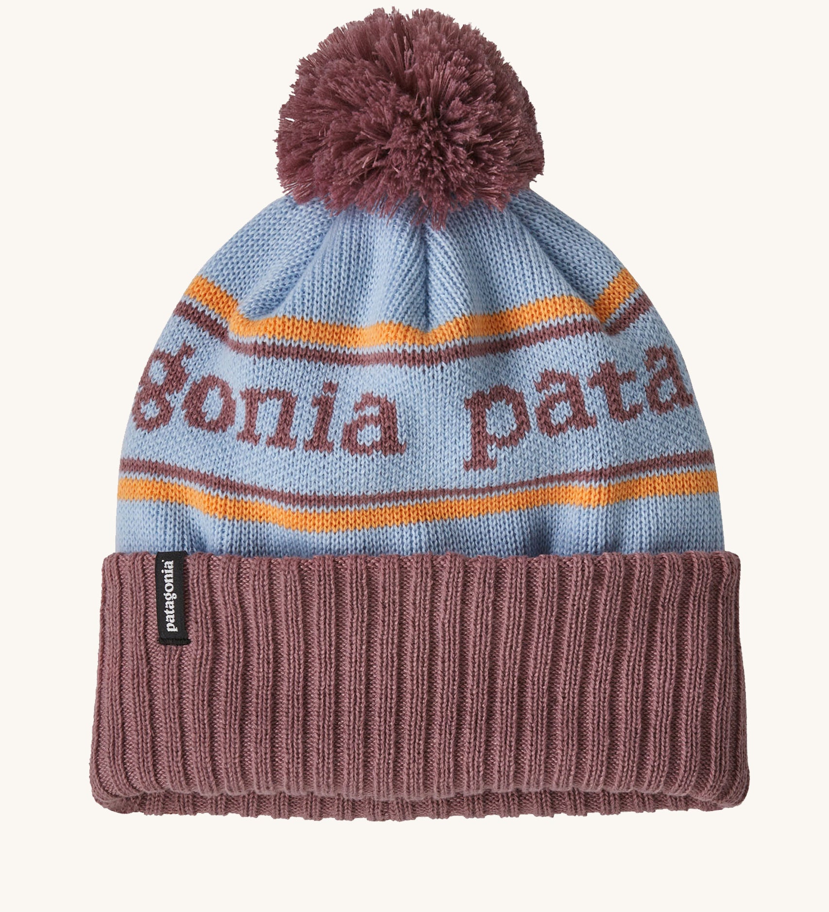 Patagonia Kids  Powder Town Beanie in a Wispy Green colour way on a plain background. 