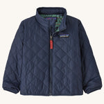 Patagonia Little Kids' Nano Puff Jacket - New Navy. A navy blue puff jacket with green Patagonia Hogs lining