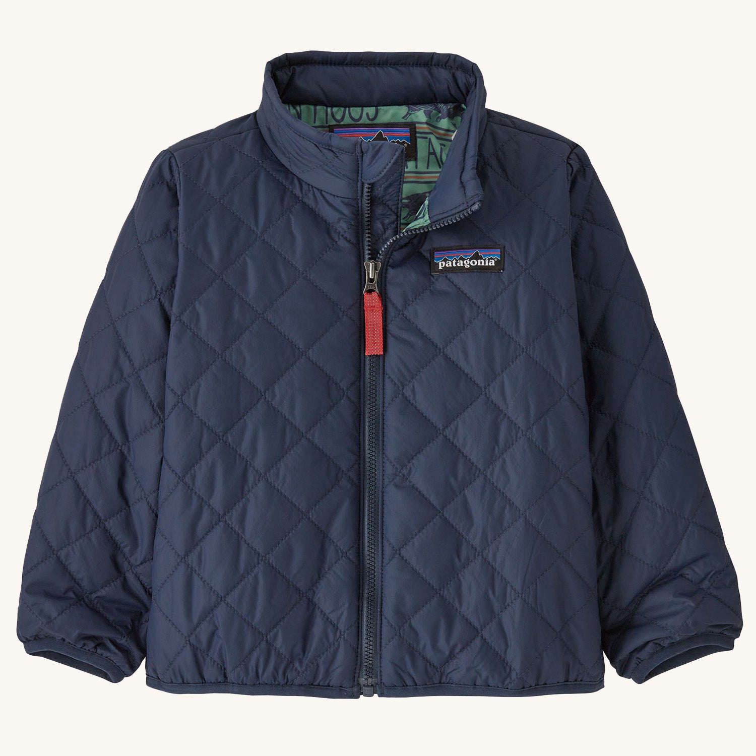 Patagonia Little Kids' Nano Puff Jacket - New Navy. A navy blue puff jacket with green Patagonia Hogs lining