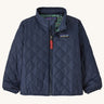 Patagonia Little Kids' Nano Puff Jacket - New Navy. A navy blue puff jacket with green Patagonia Hogs lining