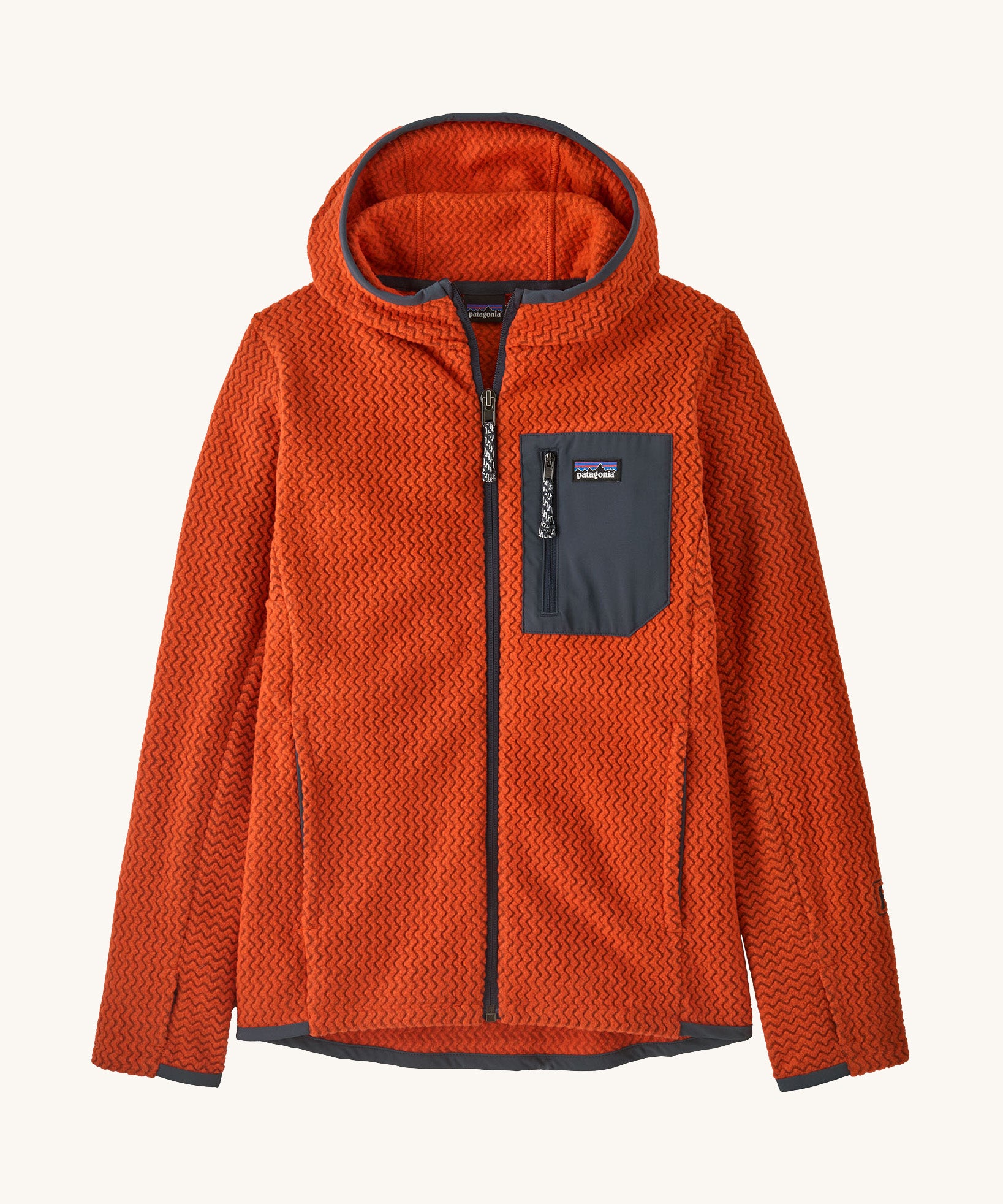 Patagonia kids full zip hoodie in a orange colour on a cream background