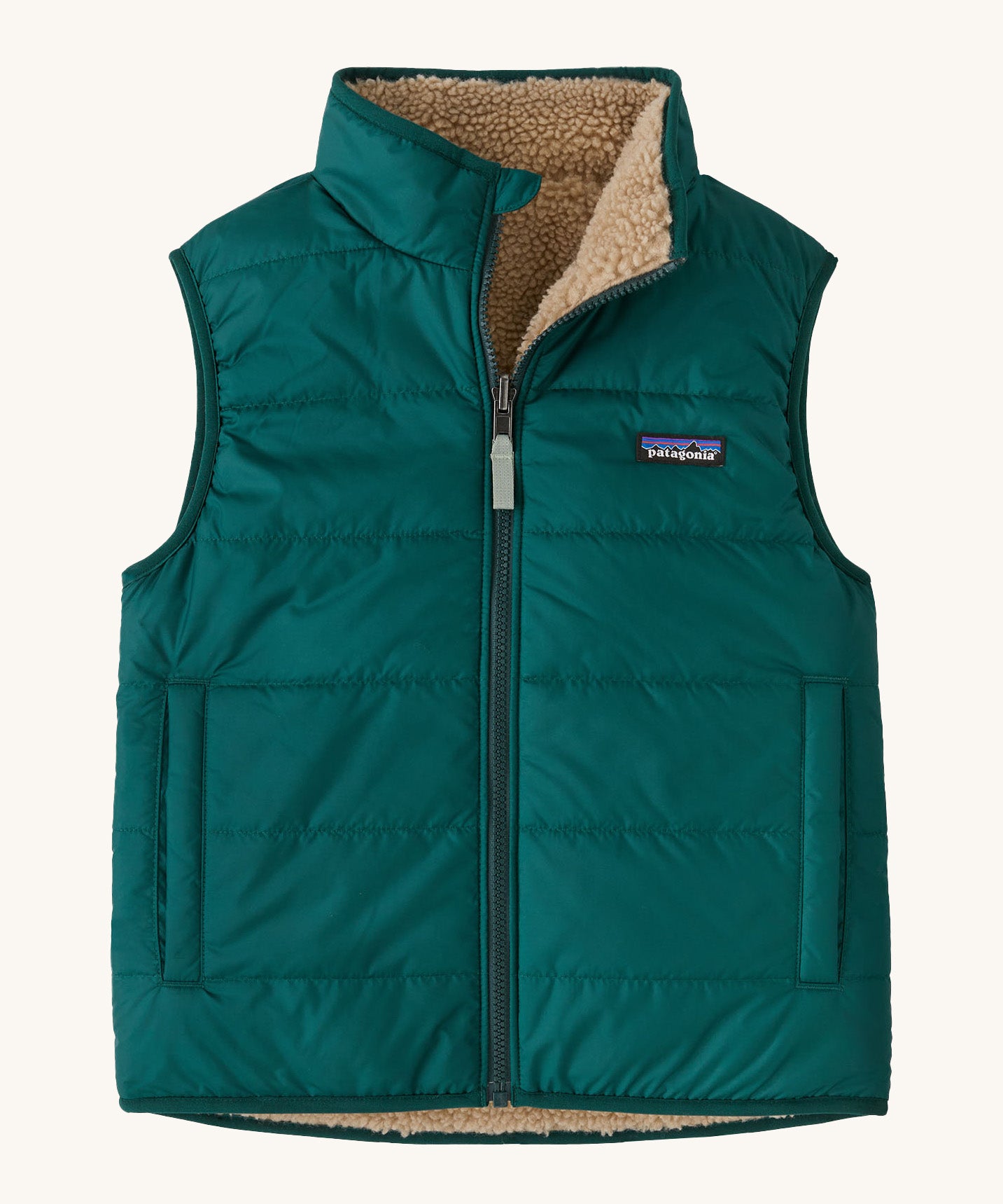Patagonia kids ready freddy vest in cascade green is a reversible gilet with a thick fleece for warmth. Features a full length zip and 2 side pockets.