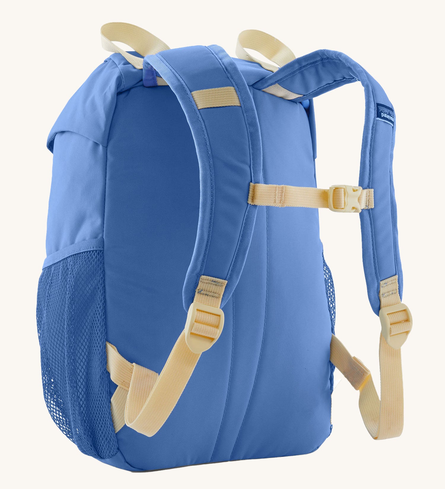 The back of the Patagonia Kids Refugito 12L Backpack in Abundant Blue on a plain background.