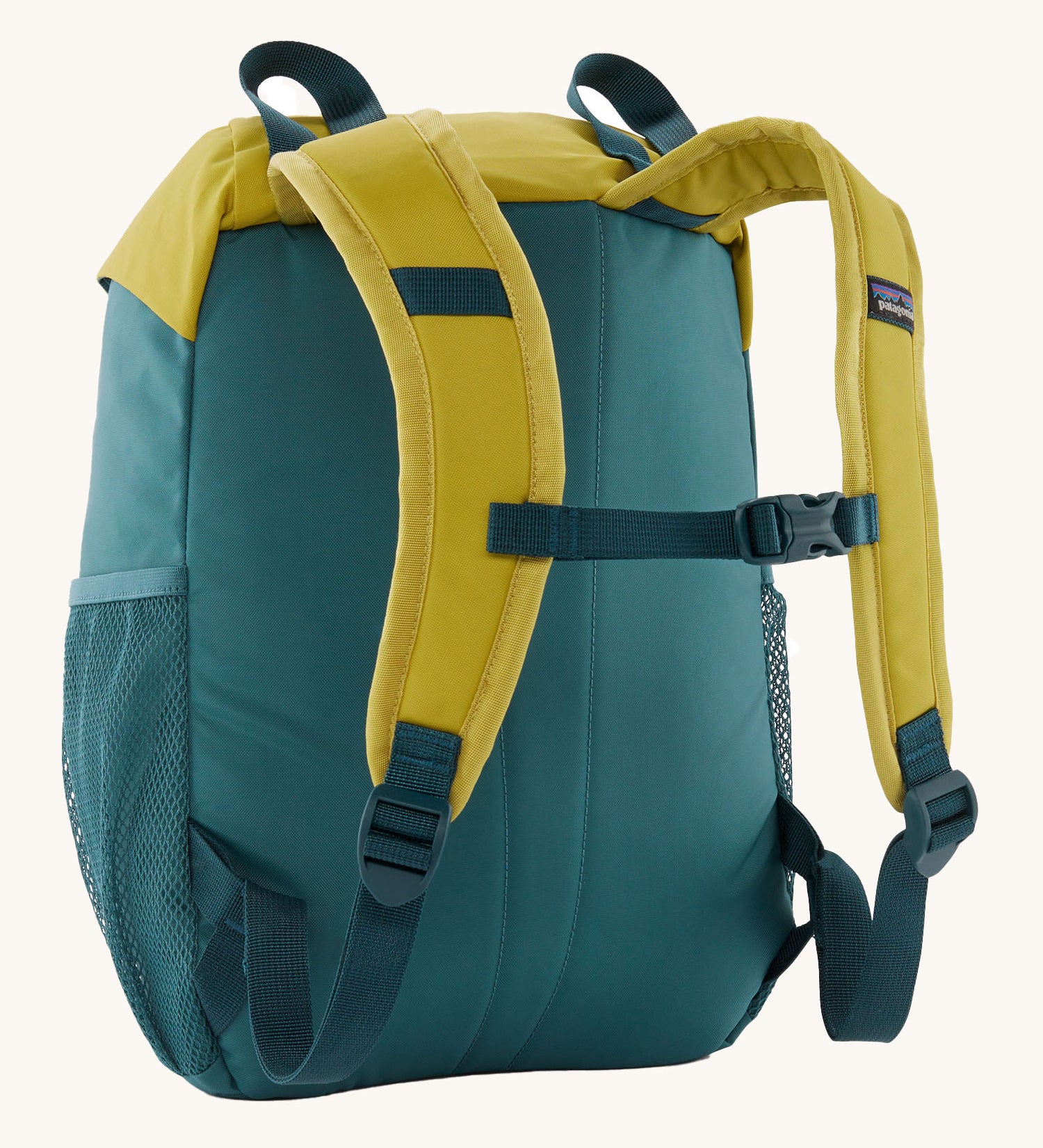 The back of the Patagonia Kids Refugito 12L Backpack in a Wetland Blue colour way on a plain background.