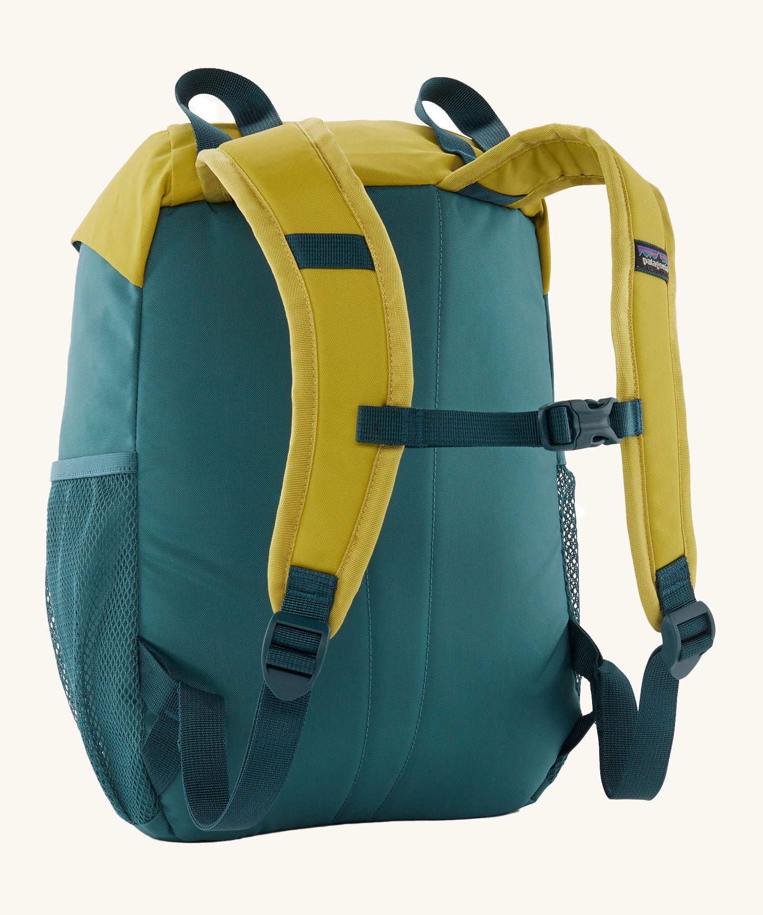 The back of the Patagonia Kids Refugito 12L Backpack in a Wetland Blue colour way on a plain background.