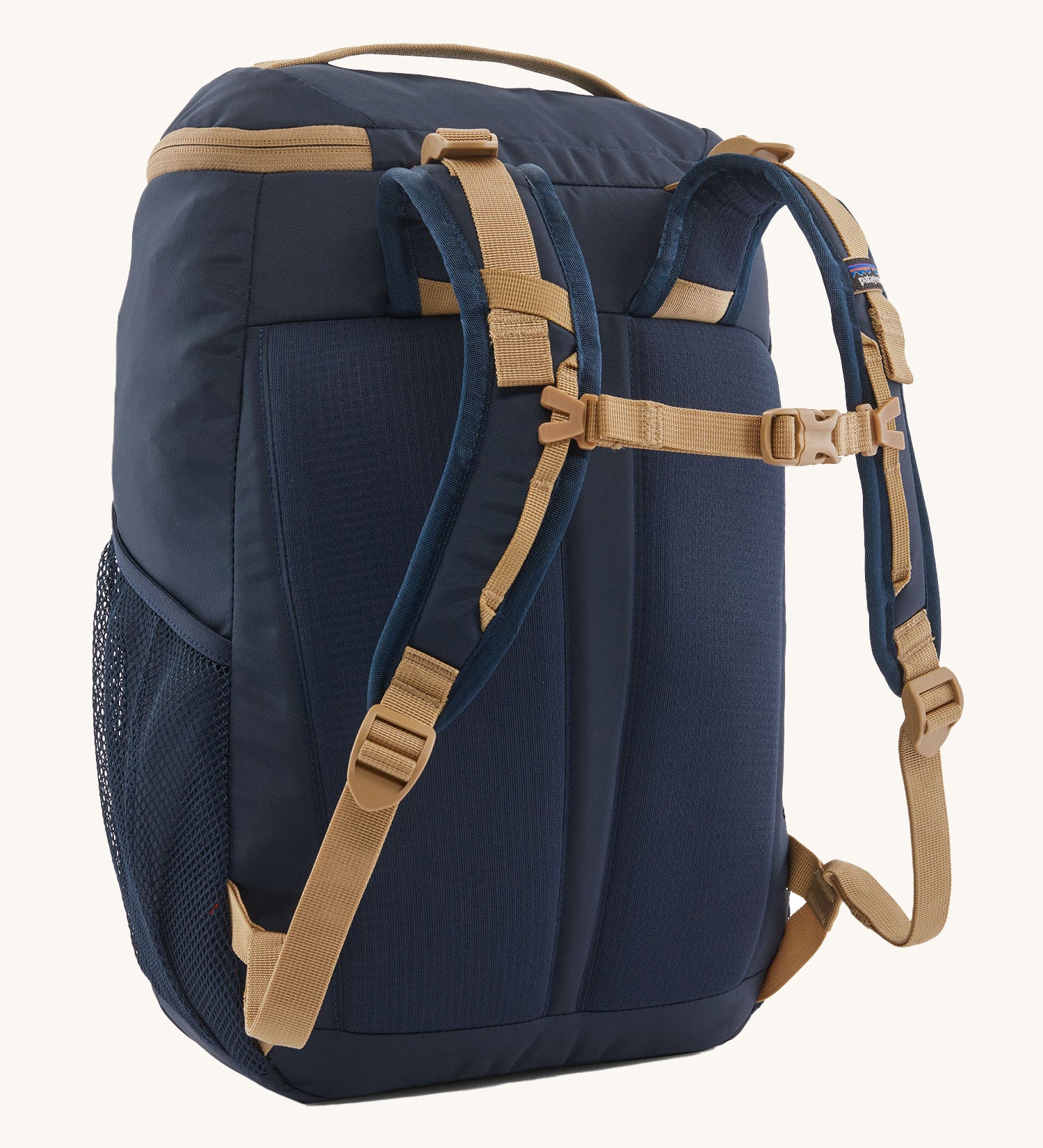 The back of the Patagonia Kids Refugito Day Pack Backpack 18L in a New Navy colour on a plain background. 