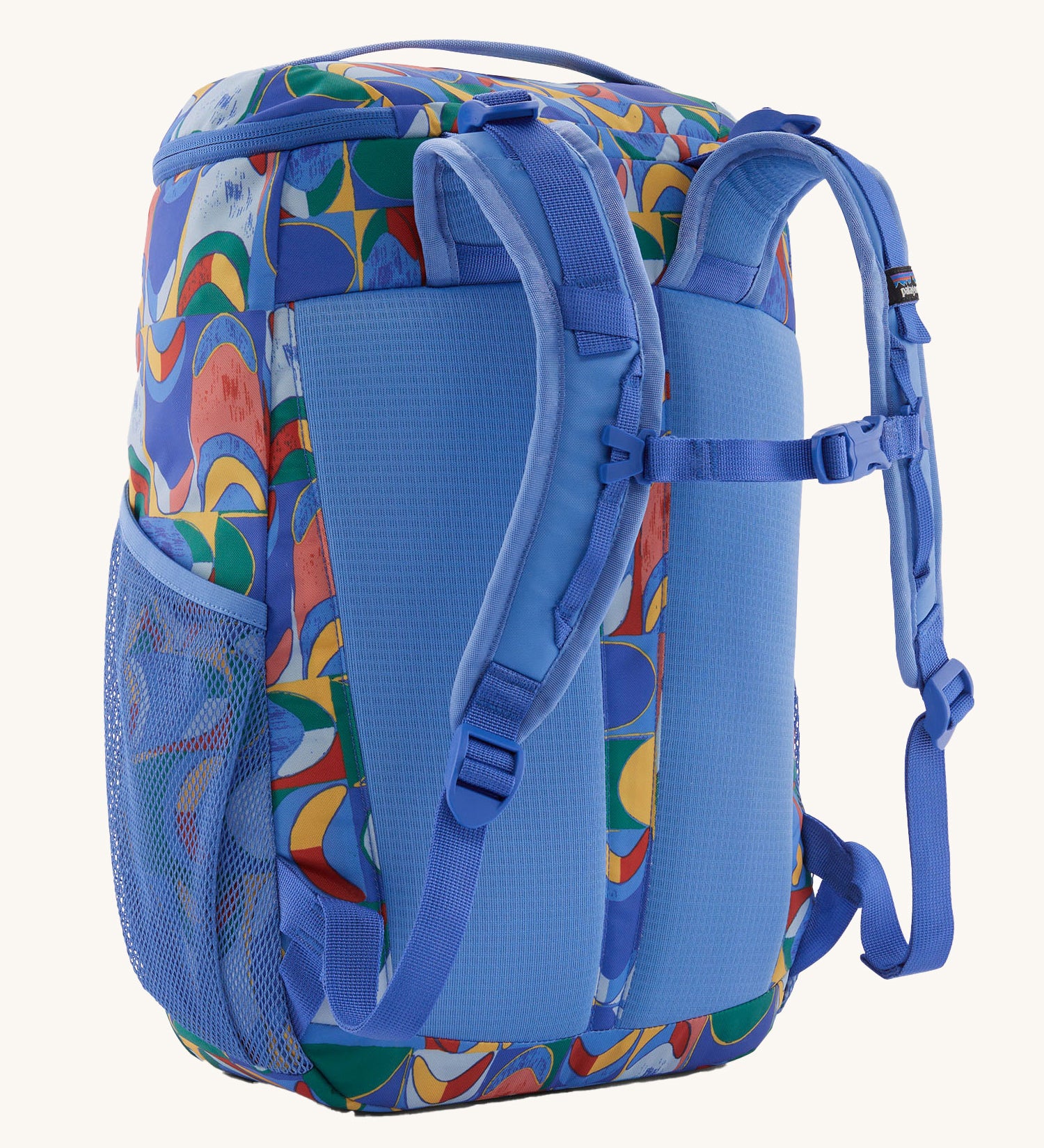 The back of the Patagonia Kids Refugito Day Pack 18L in a Swallowtail Geo / Eddy Blue design on a plain background. 