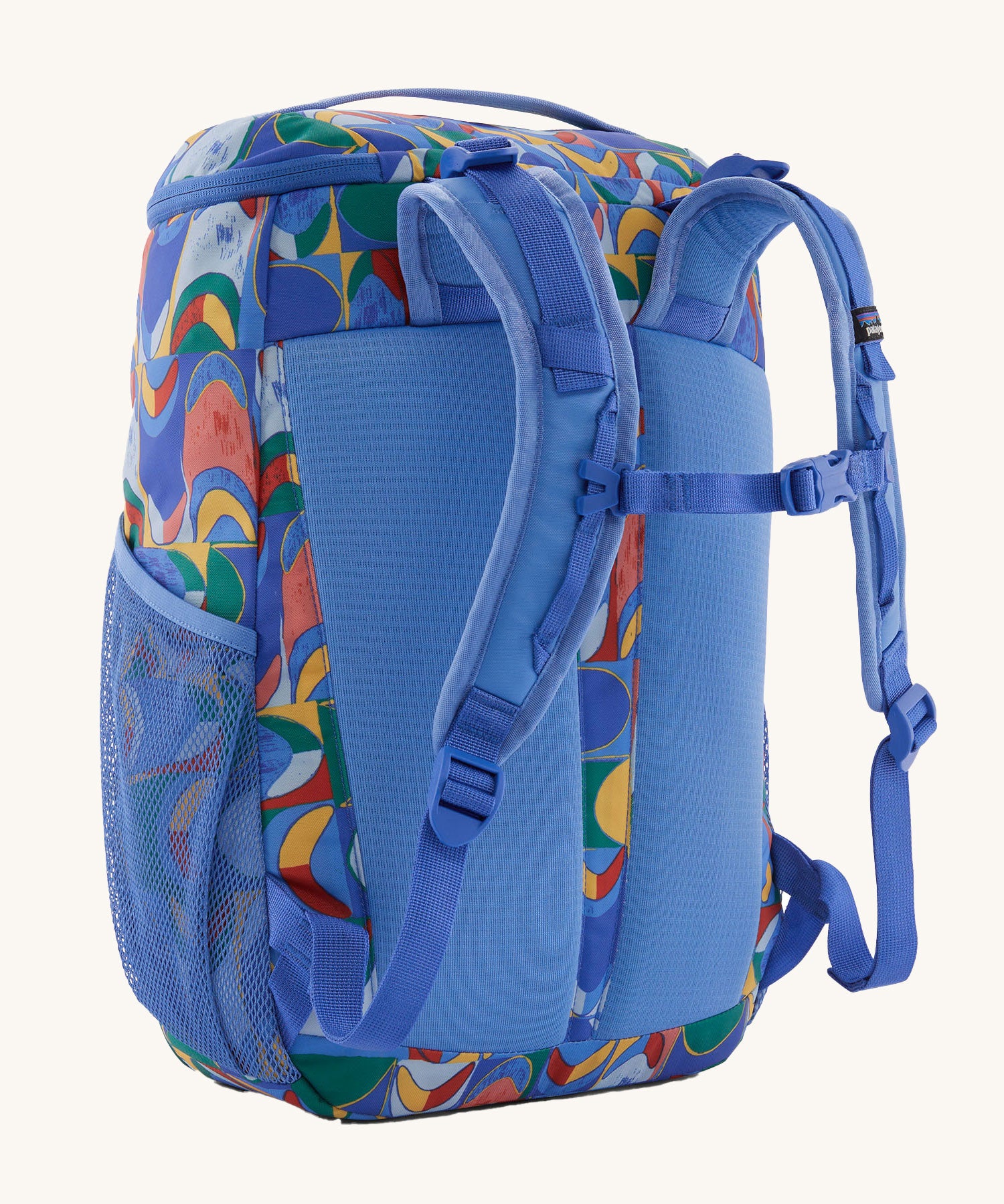The back of the Patagonia Kids Refugito Day Pack 18L in a Swallowtail Geo / Eddy Blue design on a plain background. 