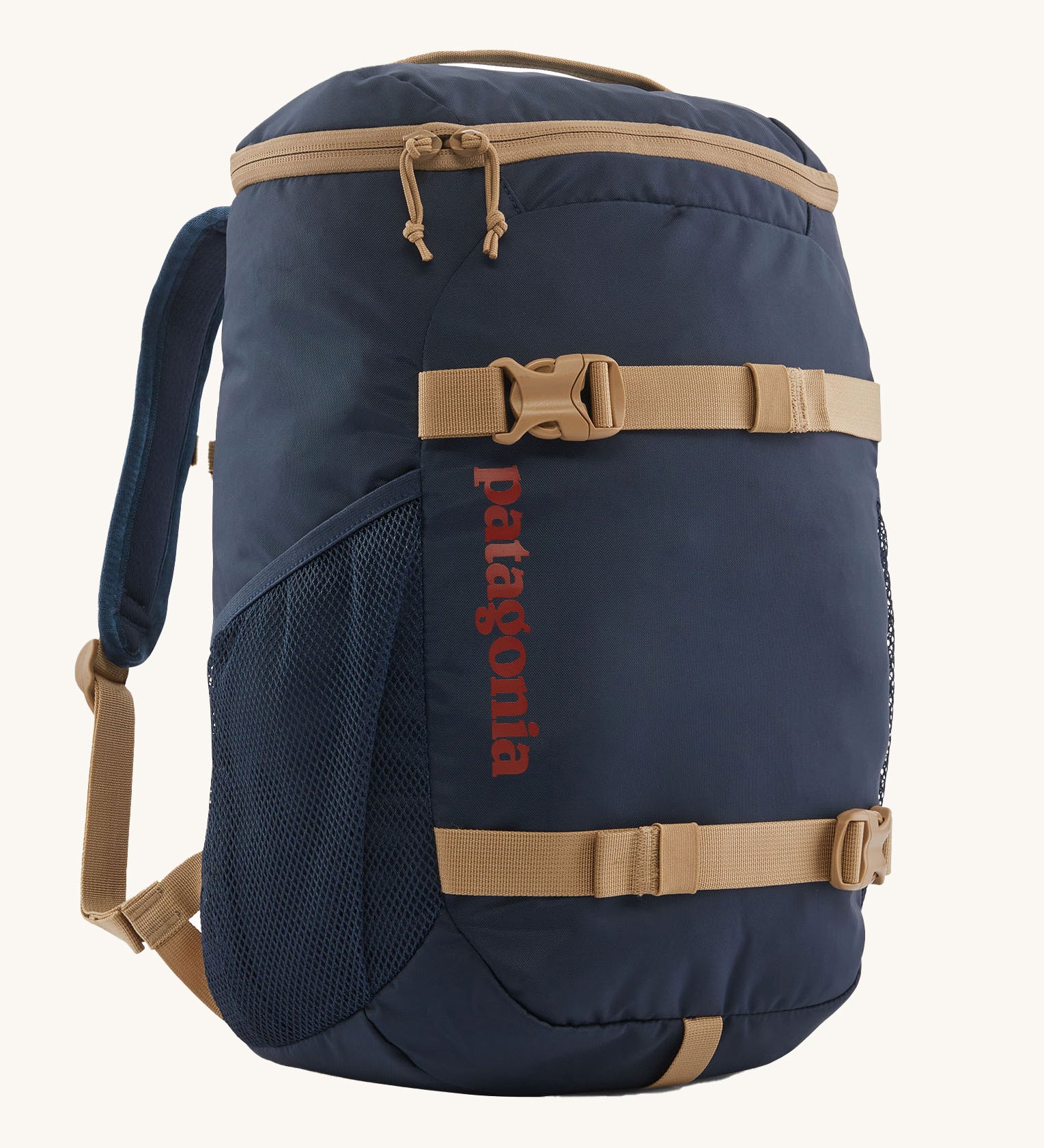 The Patagonia Kids Refugito Day Pack Backpack 18L in a New Navy colour on a plain background. 
