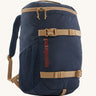 The Patagonia Kids Refugito Day Pack Backpack 18L in a New Navy colour on a plain background. 