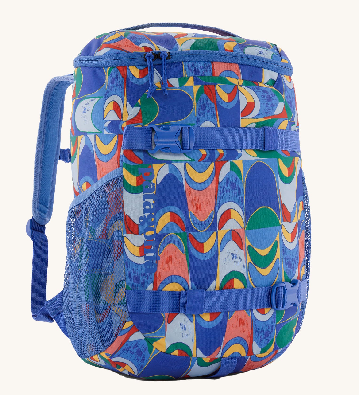 The Patagonia Kids Refugito Day Pack 18L in a Swallowtail Geo / Eddy Blue design on a plain background. 