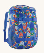The Patagonia Kids Refugito Day Pack 18L in a Swallowtail Geo / Eddy Blue design on a plain background. 