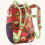 The back of a Patagonia Kids Refugito 12L in a Mirage design on a plain background.