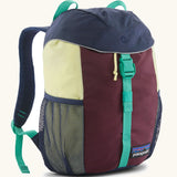 Patagonia 12 litre kids refugito day pack backpack in berry fig. Covered drawsting main compartment with  mesh pocket bottle holders on the sides.