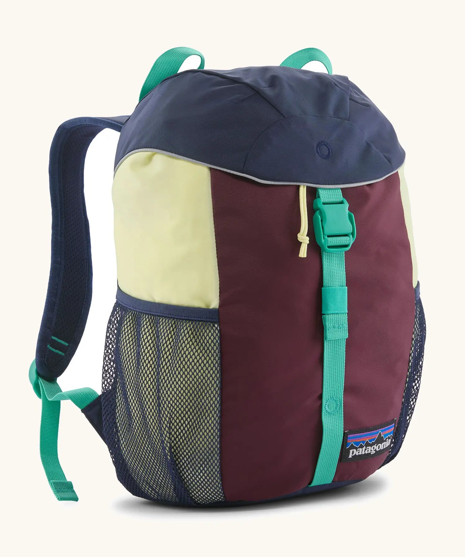 Patagonia 12 litre kids refugito day pack backpack in berry fig. Covered drawsting main compartment with  mesh pocket bottle holders on the sides.