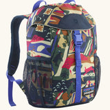 Patagonia 12 litre kids refugito day pack backpack in new navy with a let's chat pattern. Covered drawstring main compartment with  mesh pocket bottle holders on the sides.