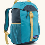 Patagonia 12 litre kids refugito day pack backpack in mako blue. Covered drawsting main compartment with  mesh pocket bottle holders on the sides.